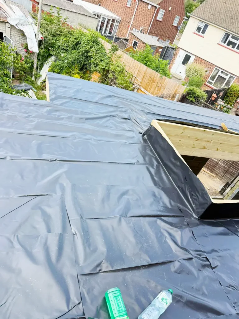 Flat roof waterproof membrane installation.