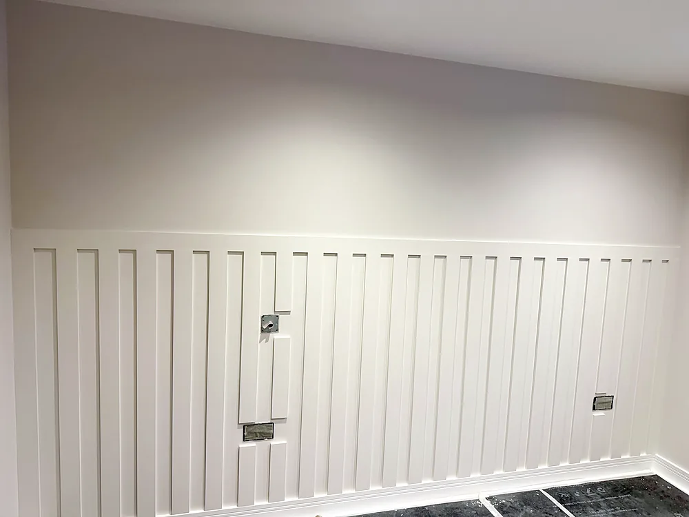Half height vertical slat wall panelling painted