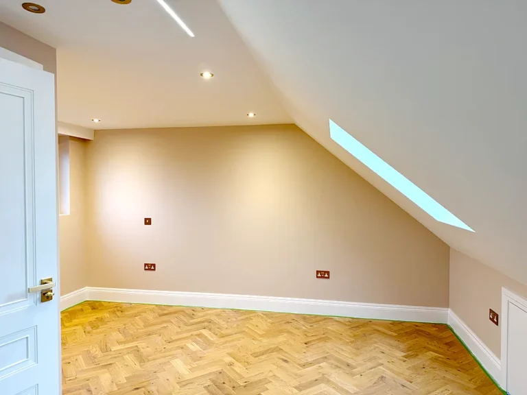 Loft bedroom herringbone floor and Velux