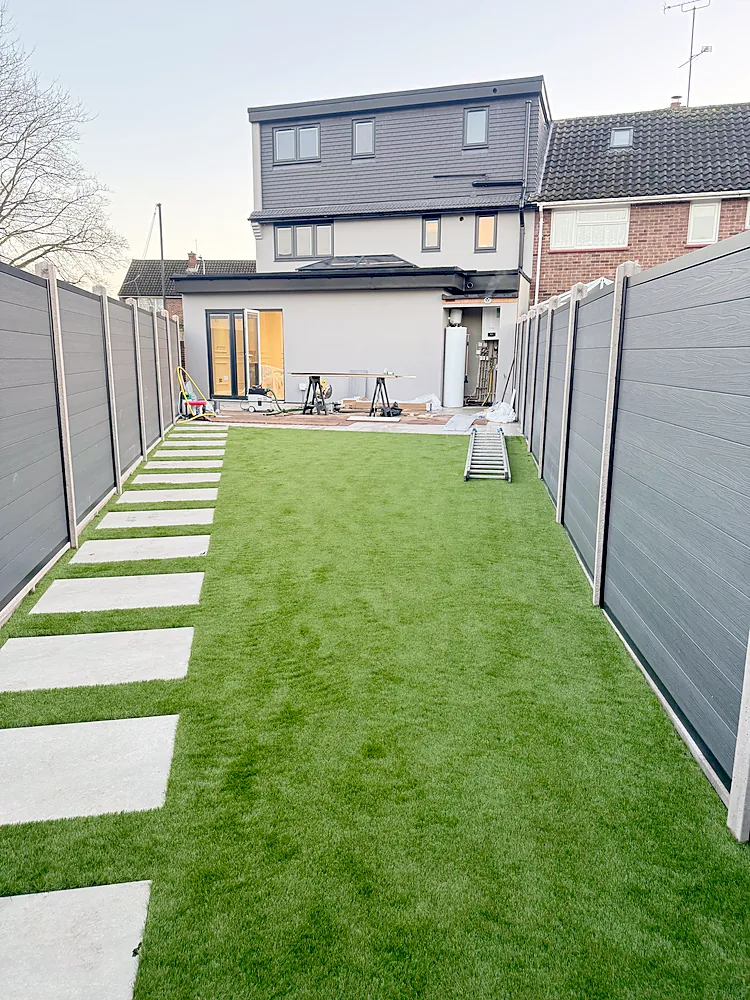 Rear garden artificial grass composite fence stepping stones