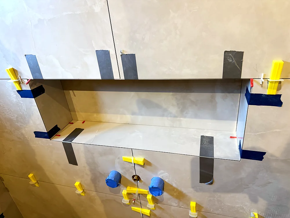 Tiled shower niche in progress