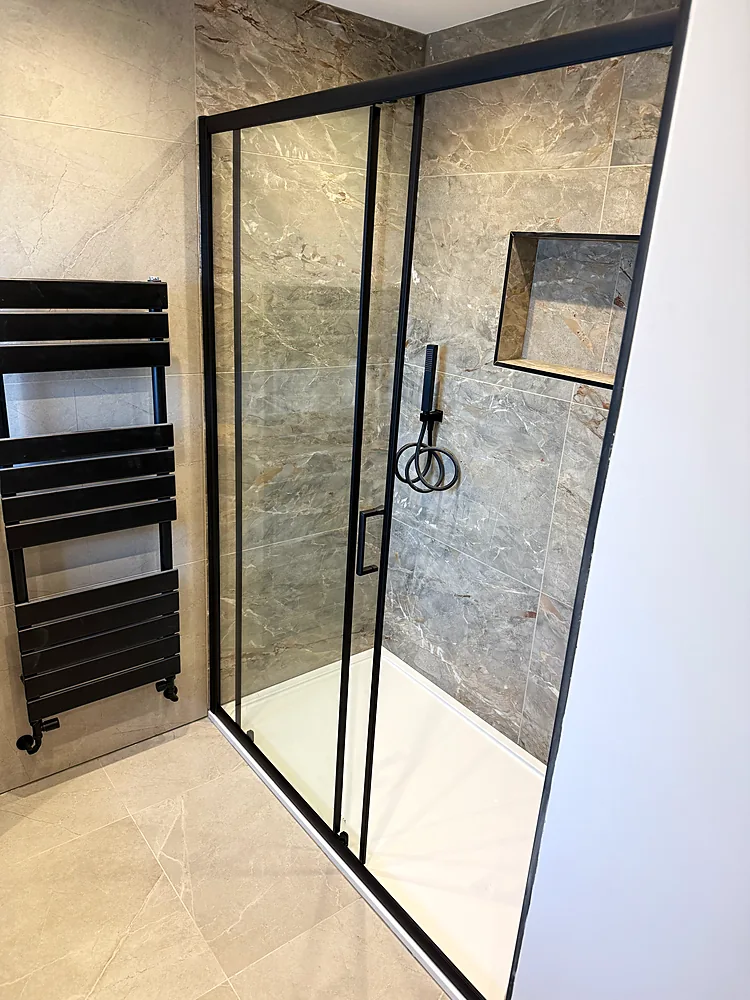 Walk in shower sliding door marble effect tiles