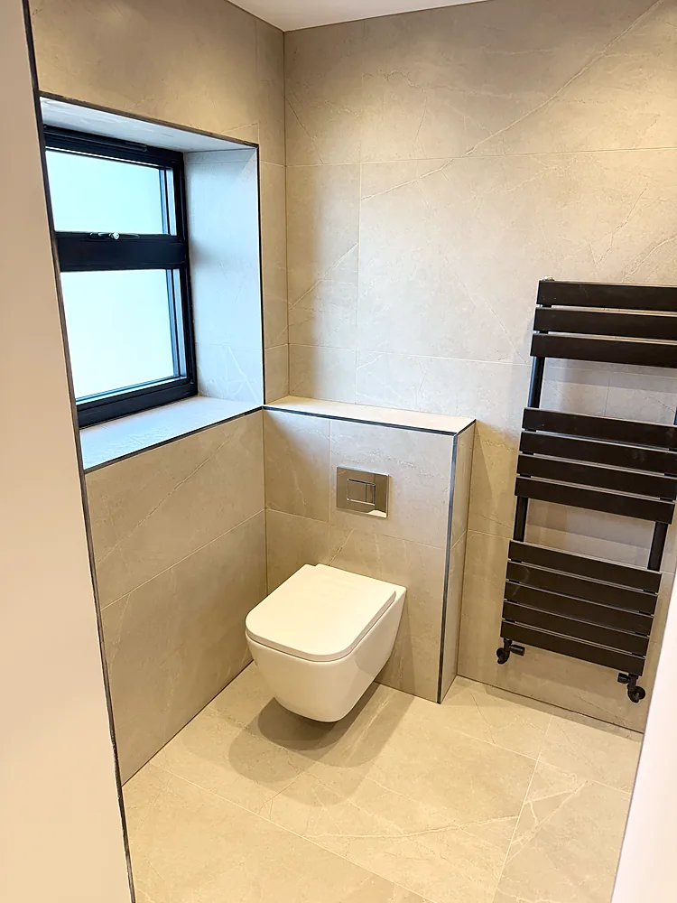 Wall hung toilet black towel radiator